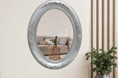 Home interior with armchair and decor in cream color living room