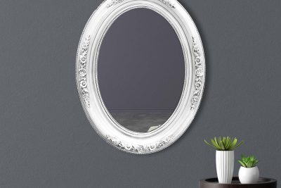 Home interior with armchair and decor in cream color living room